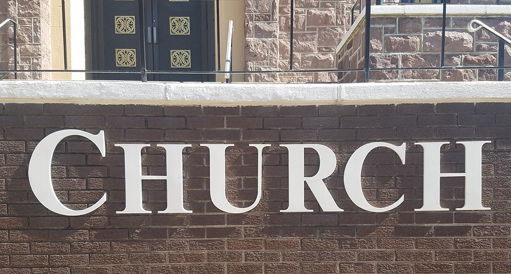 Photo of a church sign | Dubus Art Studio